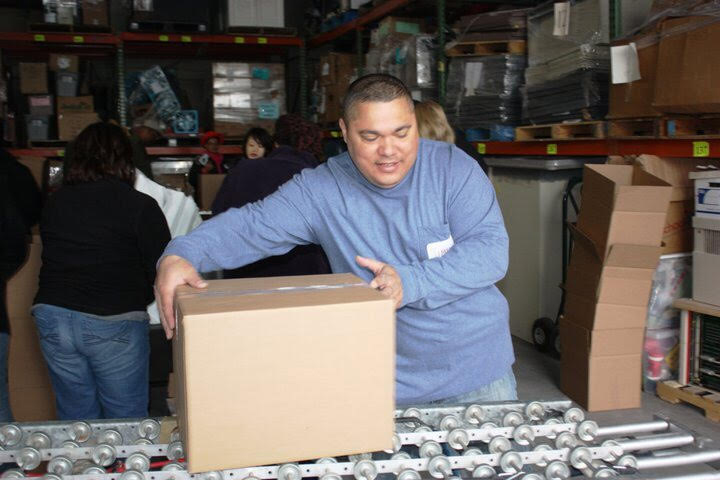 Jimmy Badillo packing a Box of Love.