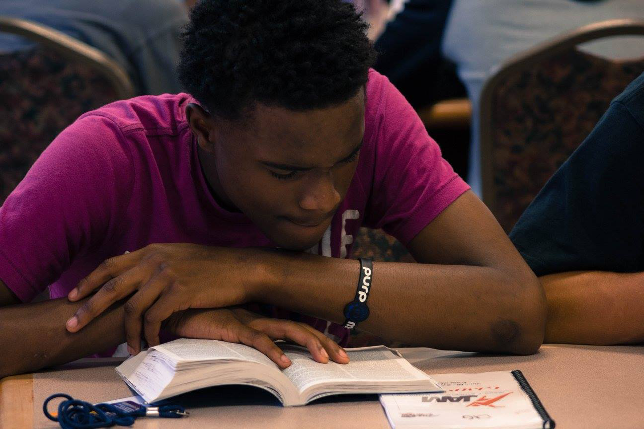 Bible study at camp. This student is not Jaquon or R.L.