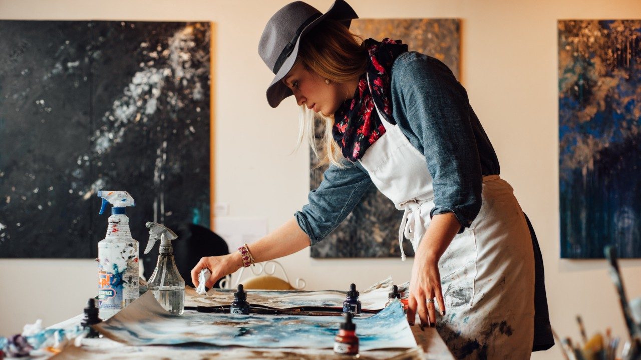 artist painting canvas
